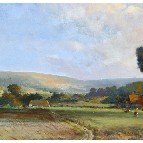 609 - Norman Dinnage, The Downs near Eastbourne, oil on board, signed, 28cm x 46cm, framed