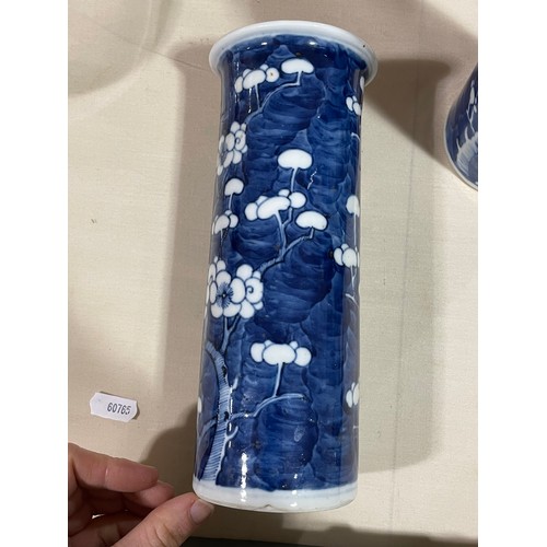 162 - A pair of Chinese blue and white Prunus cylinder vases, height 21cm