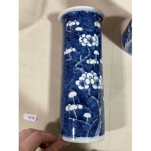 162 - A pair of Chinese blue and white Prunus cylinder vases, height 21cm