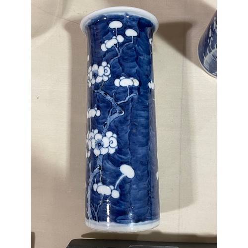 162 - A pair of Chinese blue and white Prunus cylinder vases, height 21cm