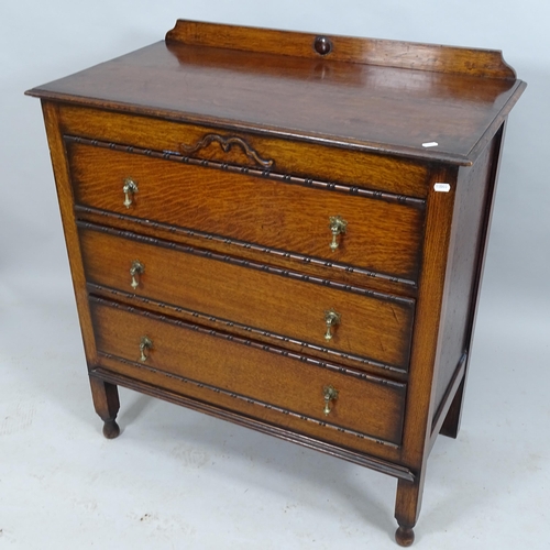 2016 - A 1920s Oak chest of three long drawers. 90x93x48cm