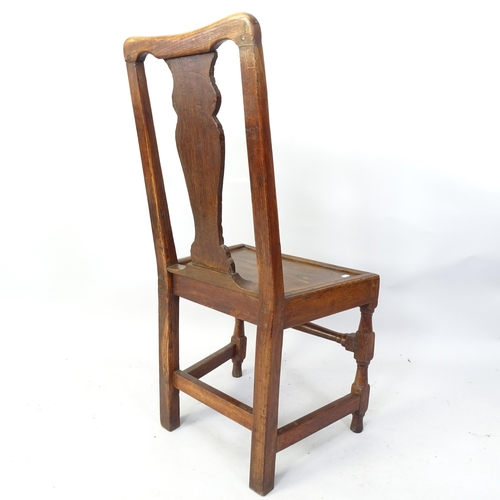 2092 - An antique carved oak hall chair