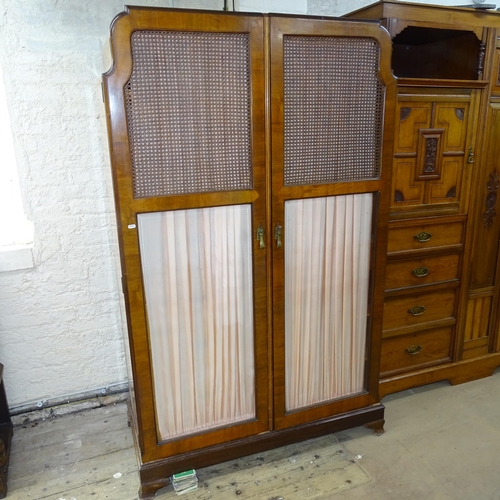 2097 - A 1930s Art Deco mahogany two door wardrobe. 122cm x 188cm x 58cm (with key)