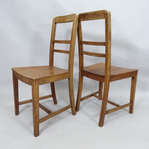 2100 - A set of four 1930s oak dining chairs