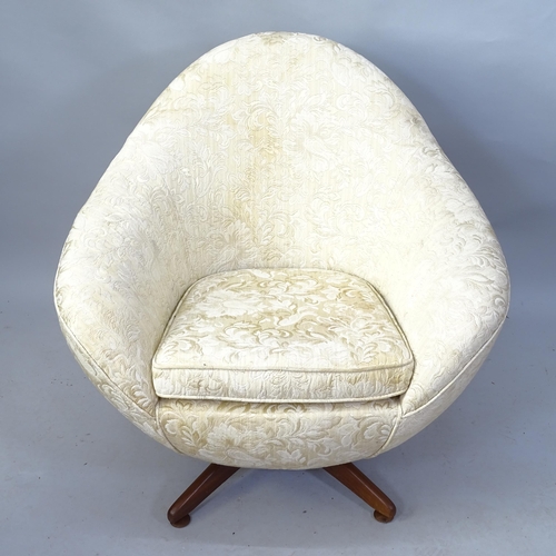 2116 - A mid-century egg design upholstered swivel lounge chair