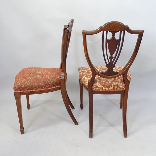 2117 - A set of four Edwardian mahogany and satinwood strung shieldback chairs with inlaid decoration