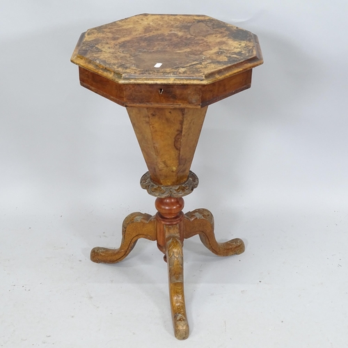 2121 - A Victorian walnut trumpet work table on tripod base. 44cm x 71cm