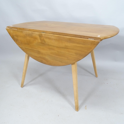 2123 - A mid-century Ercol bow-end drop leaf dining table. 113cm x 73cm x 61cm