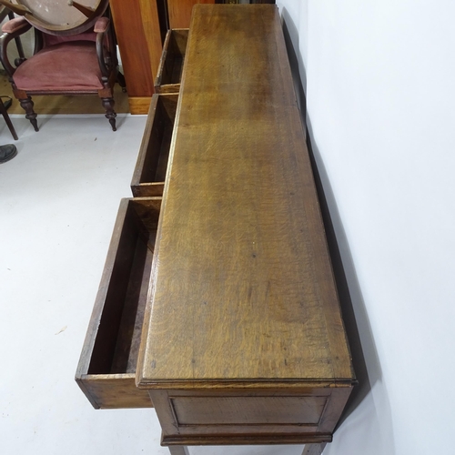 2130 - A 19th century oak dresser base with three frieze drawers. 203cm x 87cm x 45cm