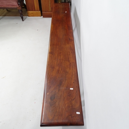 2131 - A mahogany bench with cast iron stretcher, having hinged legs. 215cm x 48cm x 31cm. Impressed 4400 3... 