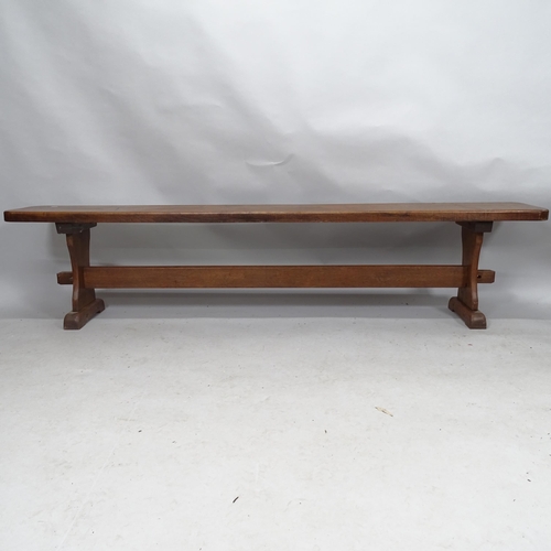 2132 - An oak bench. 199cm x 45cm x 29cm