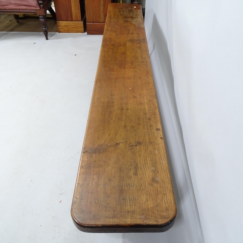 2132 - An oak bench. 199cm x 45cm x 29cm