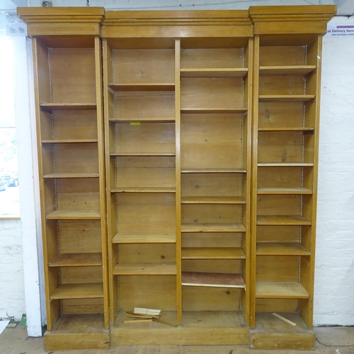 2133 - A large and impressive vintage pine three section bookcase with adjustable shelves. 210cm x 242cm x ... 