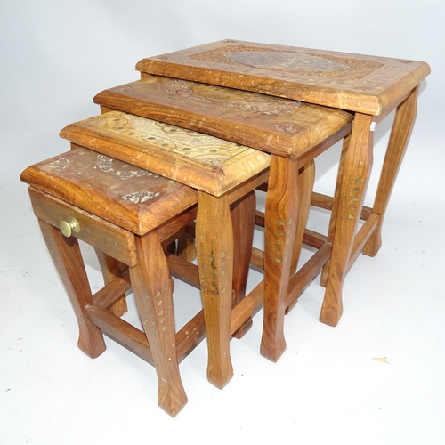 2142 - An Anglo-Indian nest of four hardwood occasional tables with inlaid brass decoration. Largest 48cm x... 