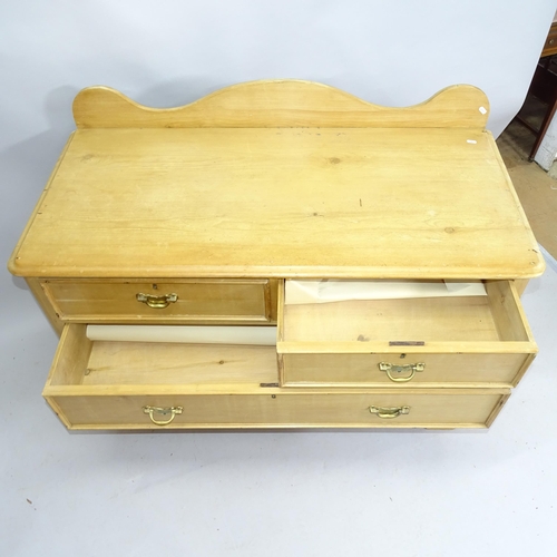 2144 - A pine chest of two short and two long drawers with raised back. 124cm x 93cm x 59cm