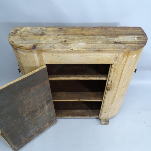 2147 - A vintage pine bow front single door cabinet with shelved interior. 110cm x 98cm x 40cm