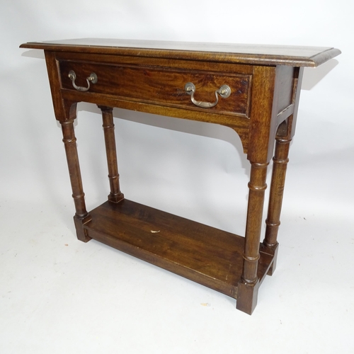 2149 - A arts and crafts style oak console table with single fitted drawer. 93cm x 76cm x 32cm