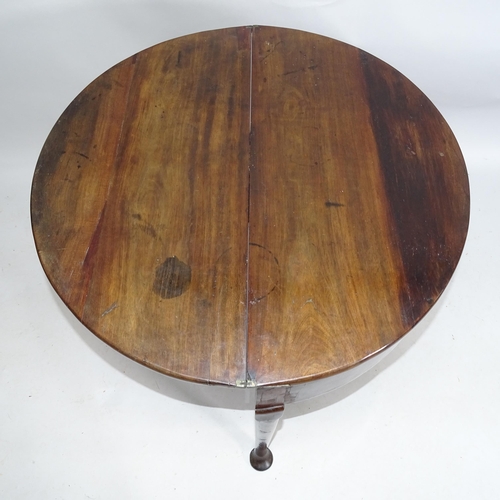 2154 - A George II mahogany fold-over tea table, on turned legs with pad feet. 78cm x 72cm x 38cm