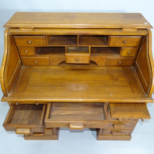 2155 - An oak tambour front roll-top twin pedestal writing desk with fitted interior and 9 drawers below. 1... 