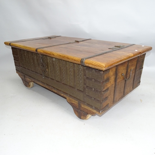 2156 - A hardwood leather covered and metal bound low storage coffee table with lifting lid. 120cm x 47cm x... 