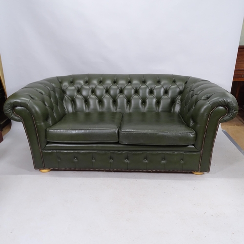 2171 - A contemporary green studded leather button back two seat chesterfield style sofa. 185cm x 76cm x 97... 