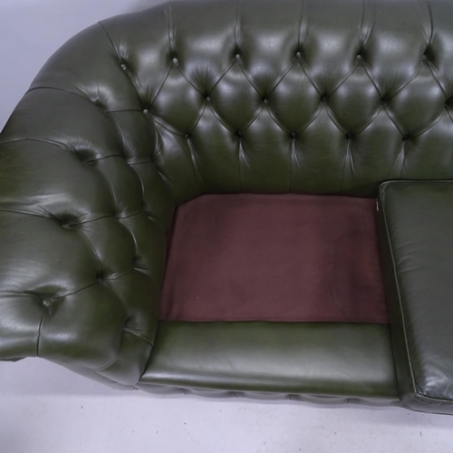 2171 - A contemporary green studded leather button back two seat chesterfield style sofa. 185cm x 76cm x 97... 