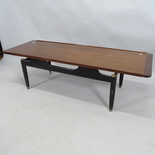 2173 - A mid-century teak G-Plan Librenza coffee table with maker's label. 138cm x 40cm x 49cm