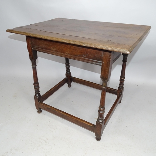 2175 - A 17th century joined oak side table on bobbin turned legs. 79cm x 68cm x 54cm