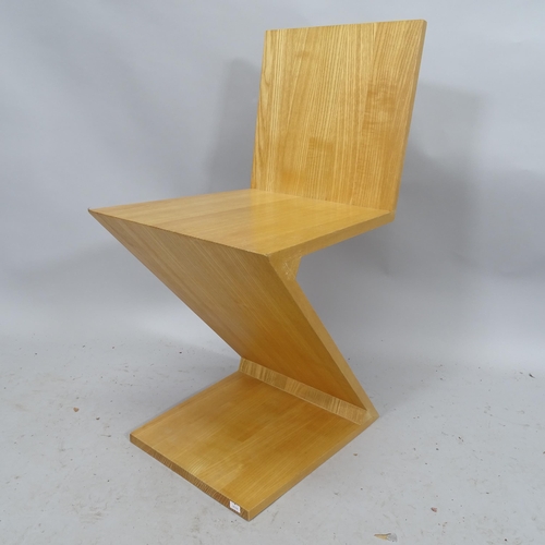 2179 - A contemporary Zigzag chair in solid ash, in the manner of Gerrit Rietveld