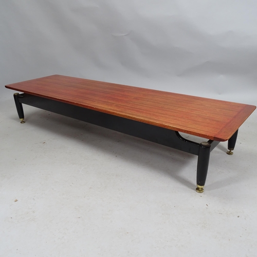 2189 - A mid-century G-plan Librenza long Tom coffee table in teak with black painted base. 1689cm x 30cm x... 