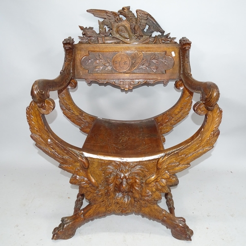 2193 - A hardwood continental renaissance-style chair with all over carved decoration