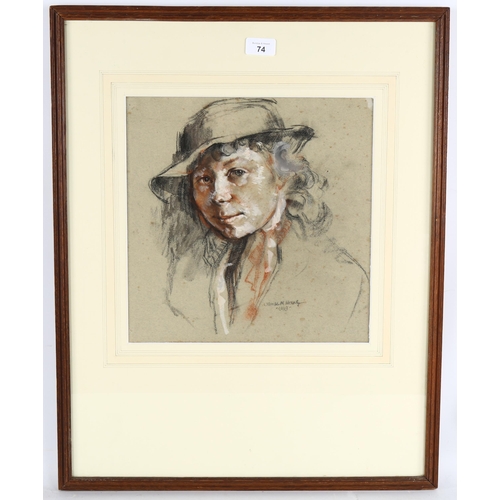 74 - 20th century British School, portrait of a girl, coloured pastels on grey paper, indistinctly signed... 