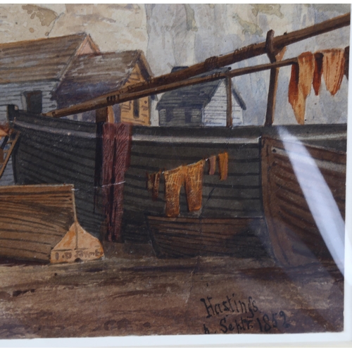 95 - 19th century English School, Hastings net huts, unsigned, dated 1852, 24cm x 36cm, mounted