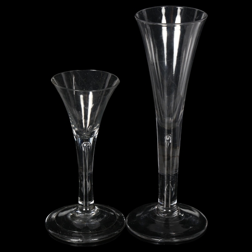 102 - 2 x 18th century wine glasses, both having trumpet bowls on teardrop stems, 1 with folded foot, H14.... 