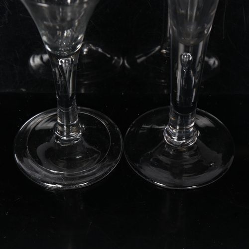 102 - 2 x 18th century wine glasses, both having trumpet bowls on teardrop stems, 1 with folded foot, H14.... 