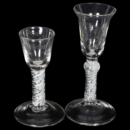 106 - A Georgian L-shaped wine glass, with air twist stem, and a liqueur glass, with air twist stem, H17cm... 