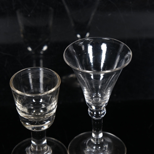 107 - 2 x 18th century liqueur glasses on plain stem and foot, H11cm and H9cm