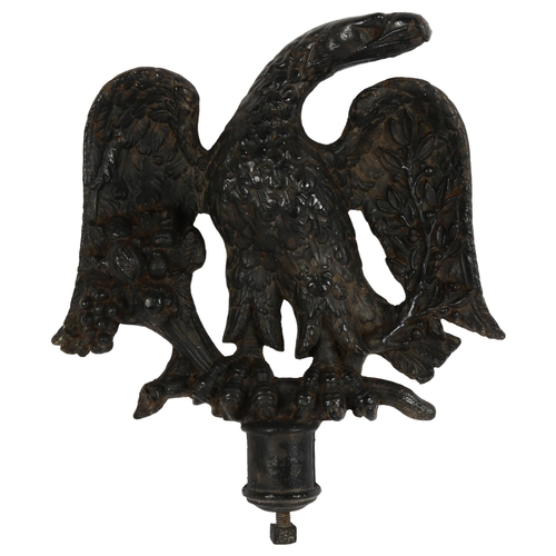 11 - A Victorian cast-iron eagle finial, black painted, L40cm overall, W37cm