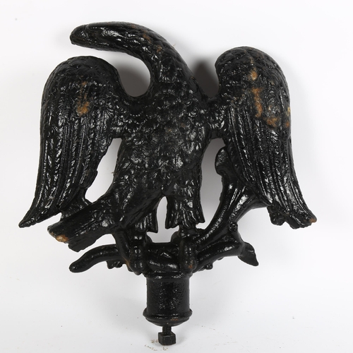 11 - A Victorian cast-iron eagle finial, black painted, L40cm overall, W37cm