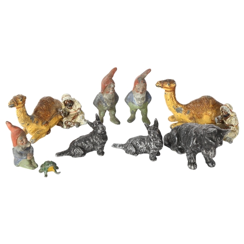 118 - A group of painted spelter animals and figures, to include a pair of Arab Nomads and their camels, T... 