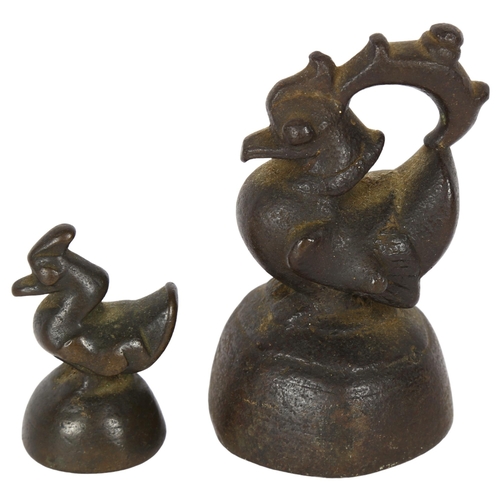 128 - 2 Burmese bronze opium weights, in the form of mythical figures, largest 9.5cm