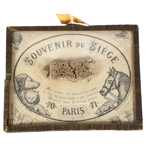 130 - A Souvenir Dusiege, container a ration of bread made from oats, starch, sawdust and horsemeat, 1 rat... 