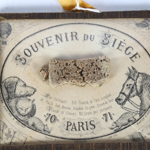 130 - A Souvenir Dusiege, container a ration of bread made from oats, starch, sawdust and horsemeat, 1 rat... 