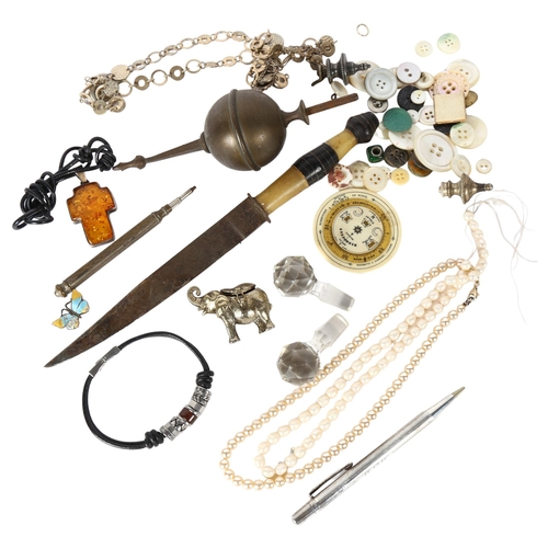 148 - A box of various items, to include a dagger, a silver pencil, miniature elephant, pillbox etc