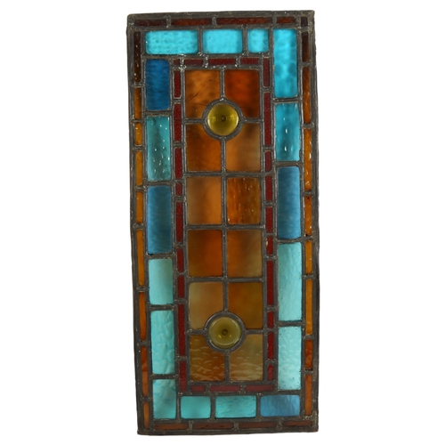 15 - A rectangular coloured leadlight glass panel, W25cm, H57cm