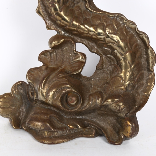 163 - A cast-brass doorstop in the form of a dolphin, H35cm