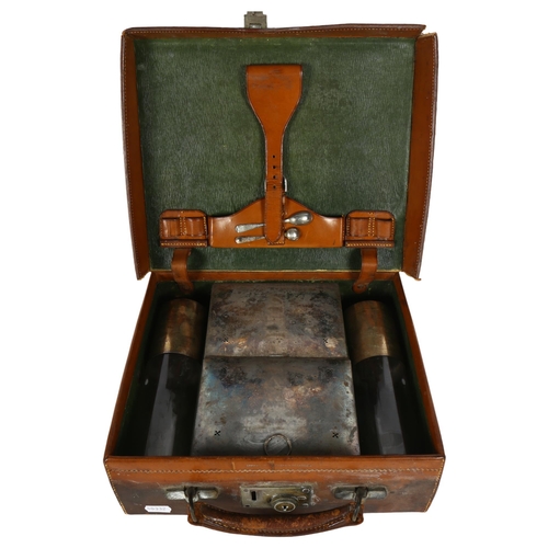 172 - ASPREY & COMPANY - an early 20th century picnic hamper, with 2 metal sandwich boxes, and 2 glass fla... 