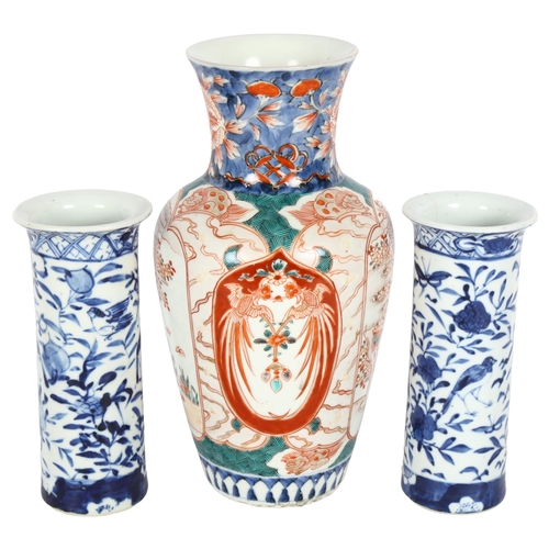 179 - A Chinese baluster vase with painted decoration, no markings, H24cm, and a pair of Chinese blue and ... 