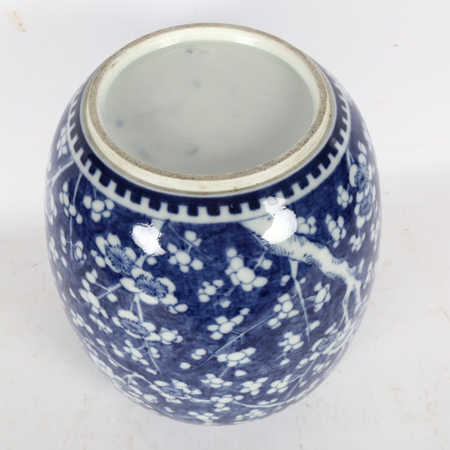 180 - A large Chinese blue and white prunus decorated vase, H28cm