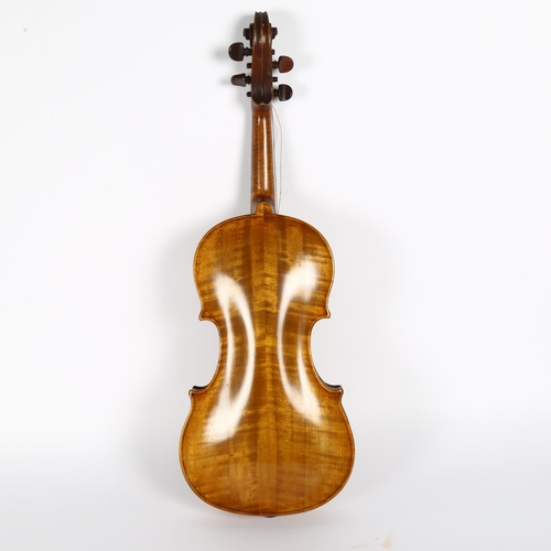 202 - An Antique violin, no labels, in a wooden case, L35cm